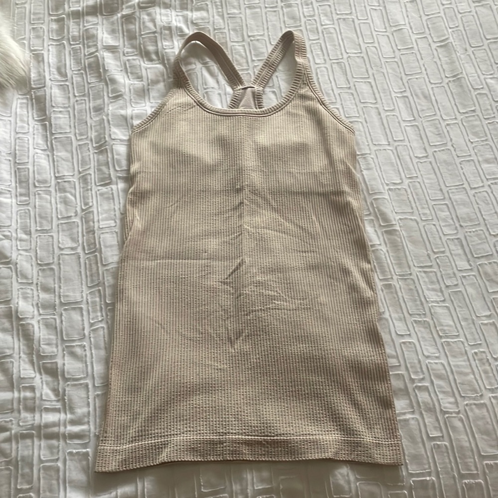 Lululemon ebb to street tank. Great condition, no stains, smoke free home.